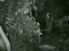 Sexy babe hither perfect body pissing in the bush at night