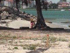 Somebody spying chiefly two sexy babes are sun tanning chiefly beach